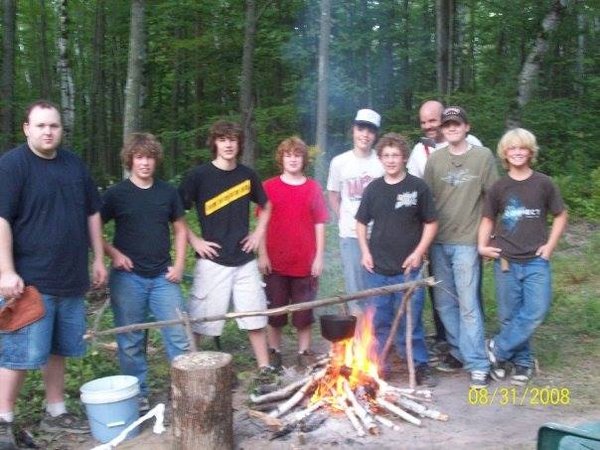 wvt camp guys at fire cooking crayfish