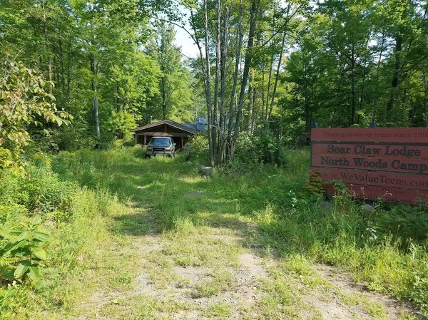 wvt camp overgrown driveway entrance with sign